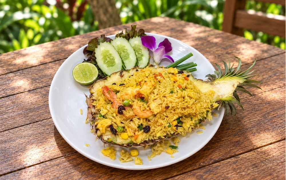 Pineapple fried rice with prawns served in a pineapple at WonderlanD, Khao Lak